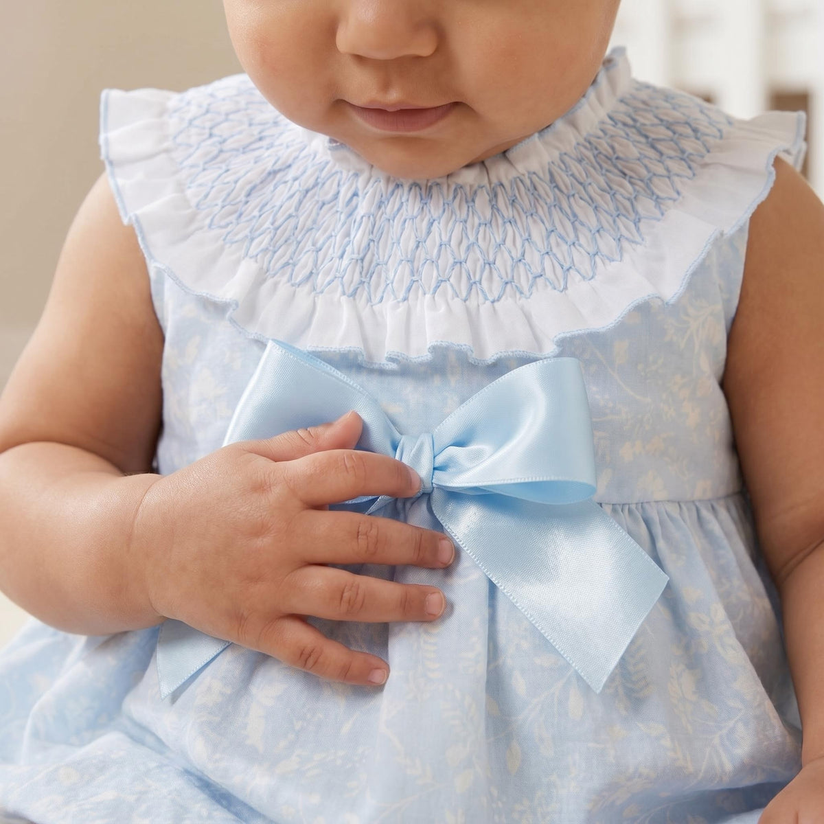 Baby Girls Pale Blue Floral Smocked Romper