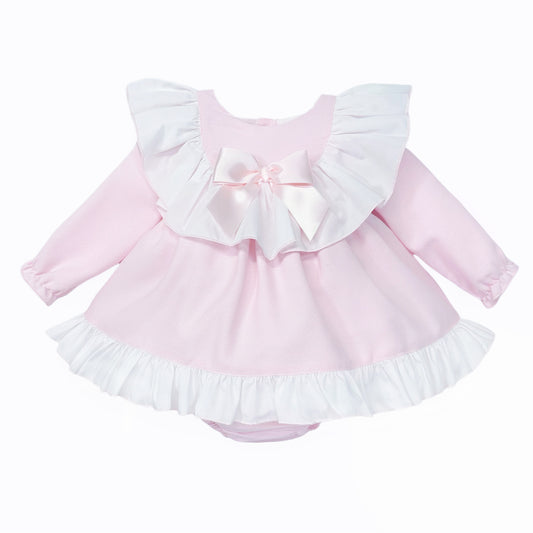 Pale pink long-sleeved baby dress with white ruffle collar and bow