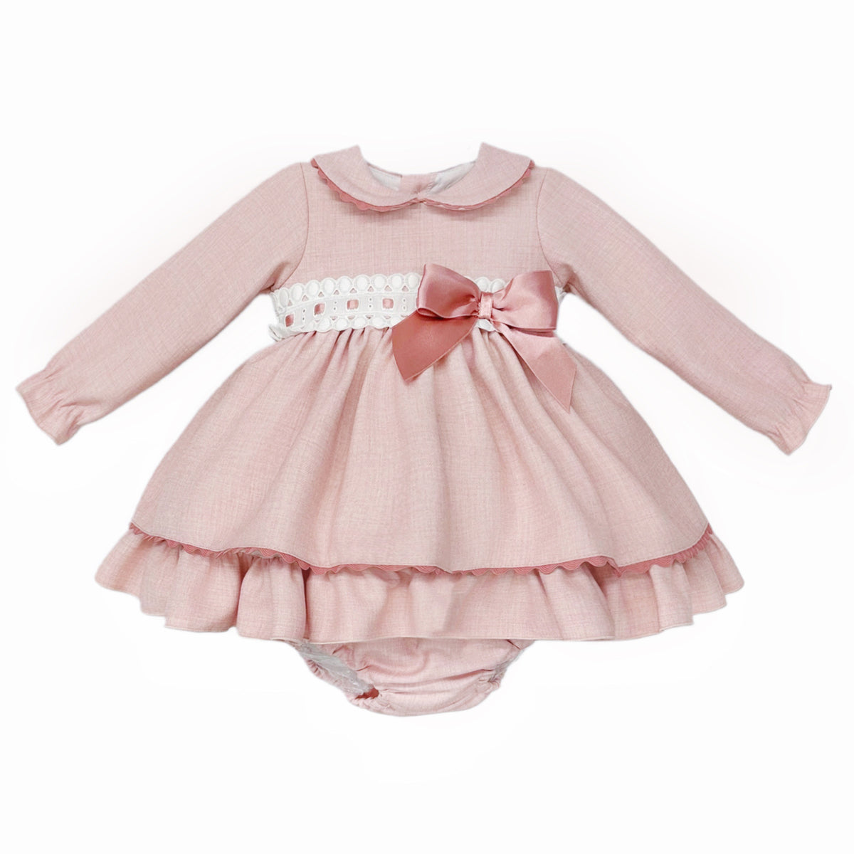 Pink dress and matching pants with white broderie waistband, rose-pink bow and rounded collar, front view