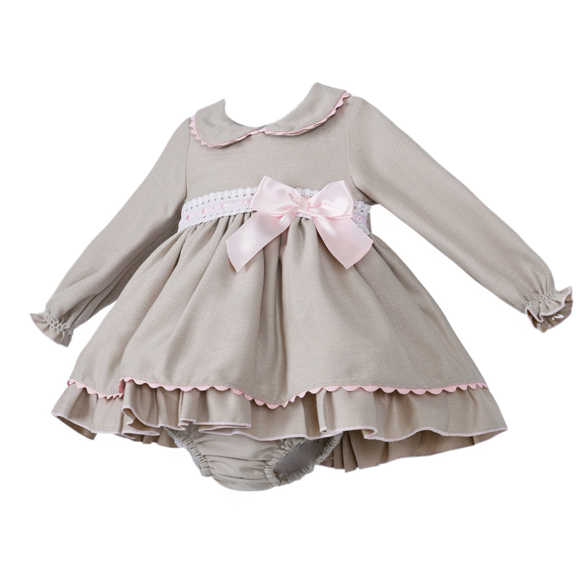 Angled view of the grey dress with pink edging, long gathered sleeves and matching pants