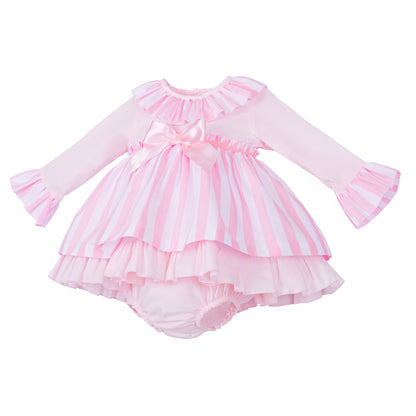 Angled view of the striped skirt, flared sleeve cuffs and plain pink hem frill
