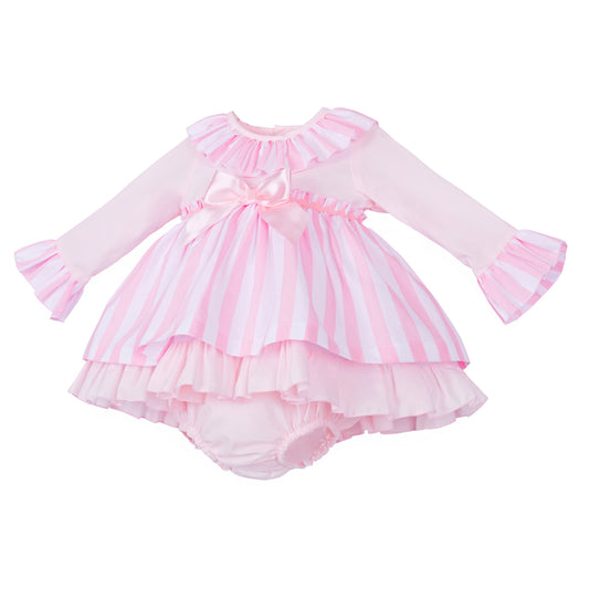 Angled view of the striped skirt, flared sleeve cuffs and plain pink hem frill