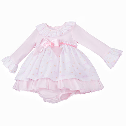 Angled view of the long-sleeved pink cloud and star dress with matching pants