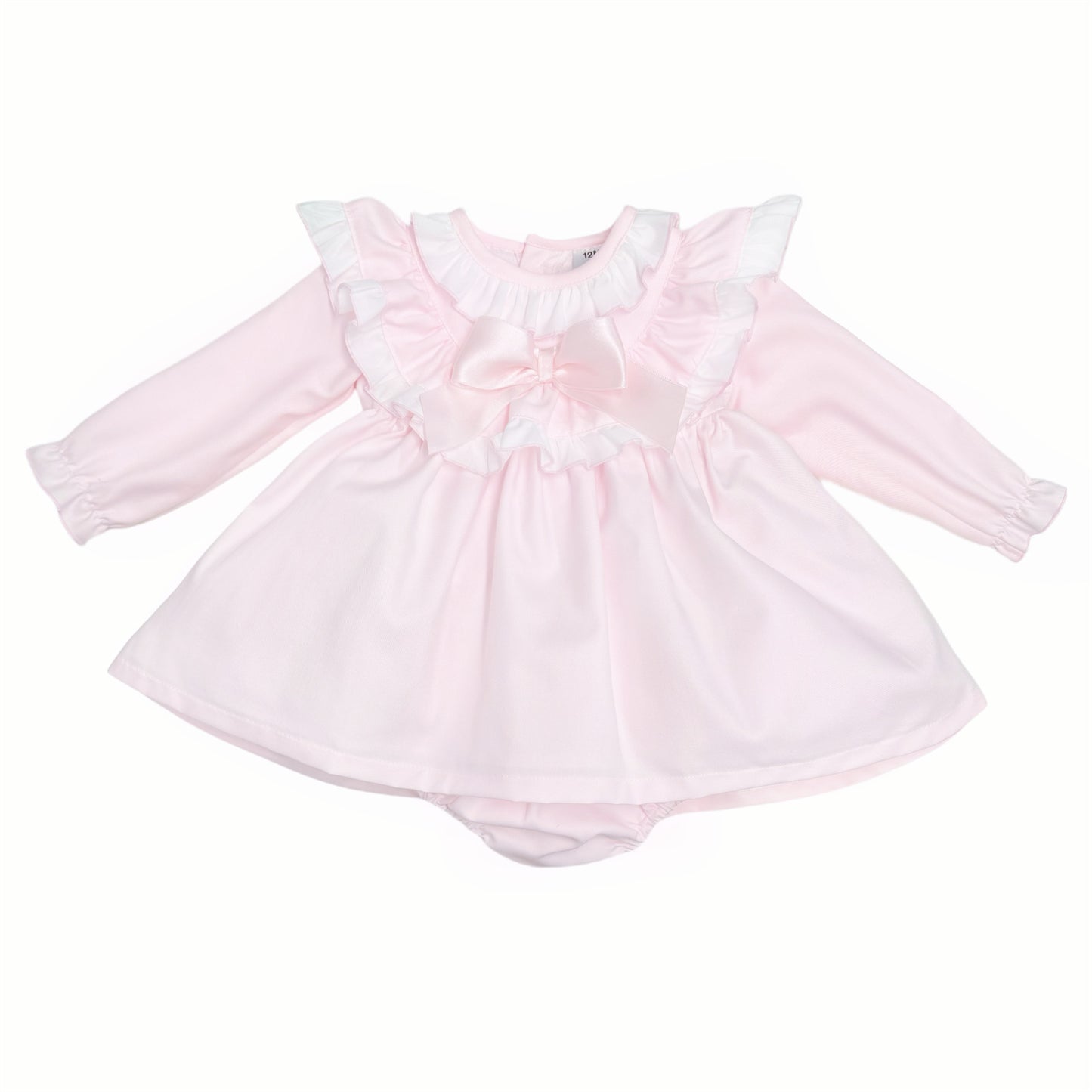 Pale pink long-sleeved baby dress with white ruffles and satin bow