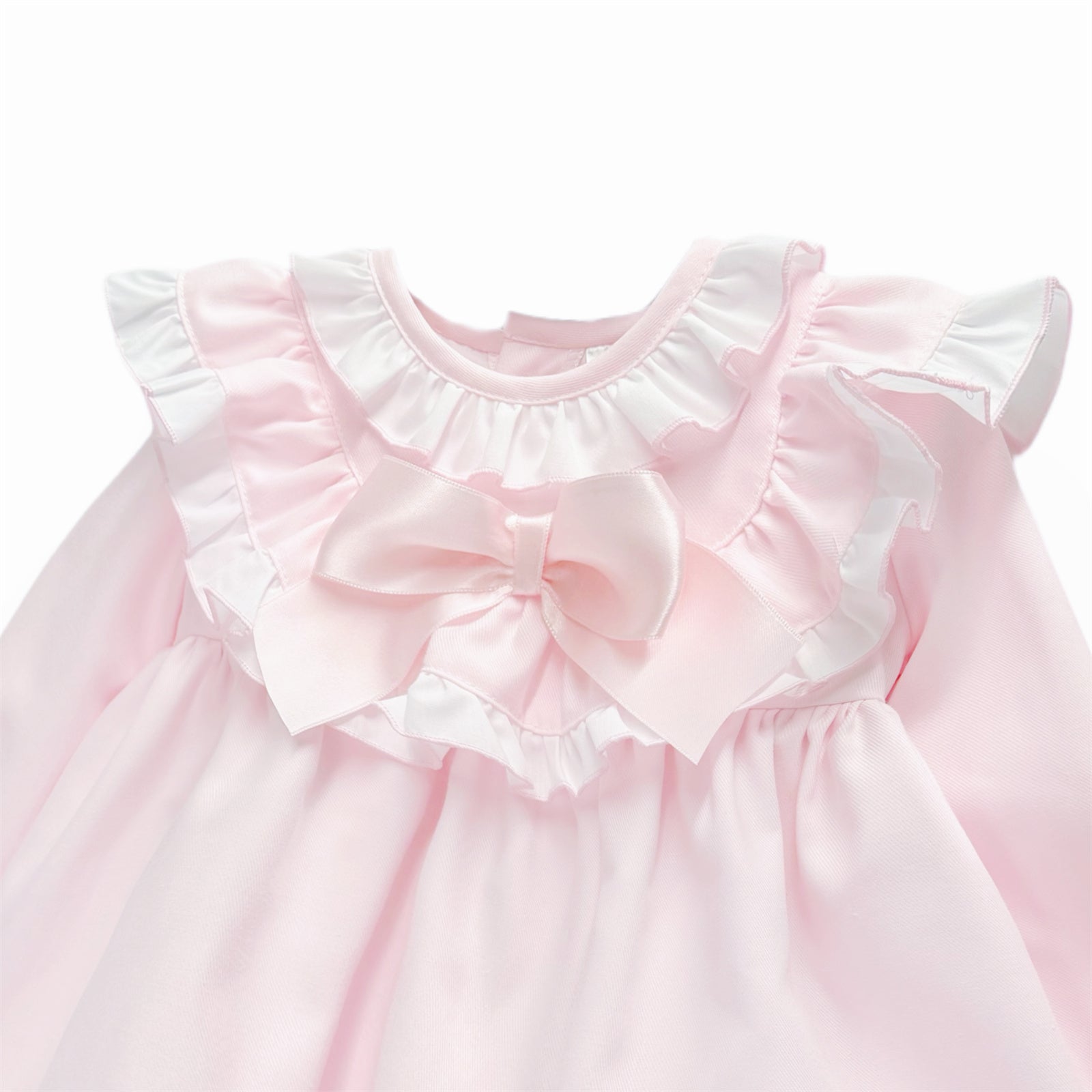 Pale pink baby dress layered ruffle and bow detail
