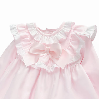 Pale pink baby dress layered ruffle and bow detail